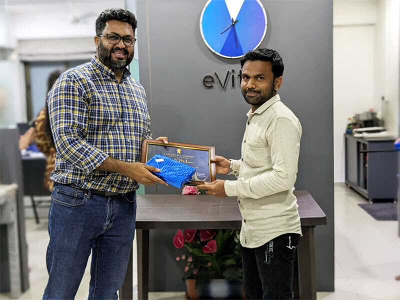 Bhavesh receiving employee of the month award at evitalrx office in ahmedabad. Life at evital