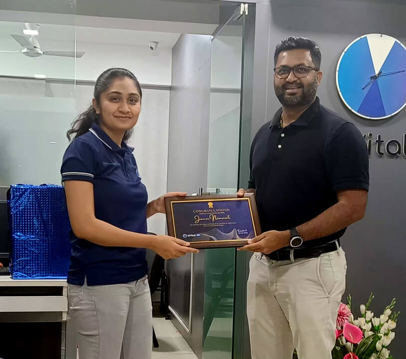 Janvi receiving employee of the month award at evitalrx office in ahmedabad. Life at evital