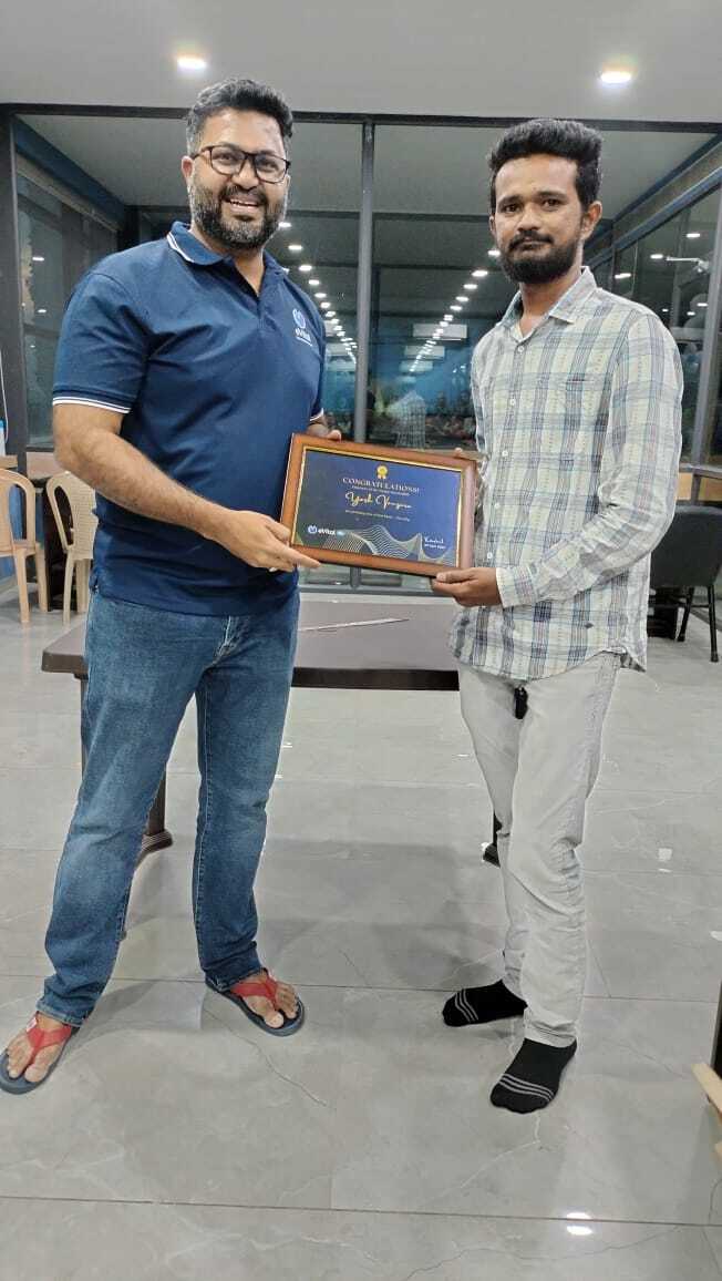 Bhavesh receiving employee of the month award at evitalrx office in ahmedabad. Life at evital